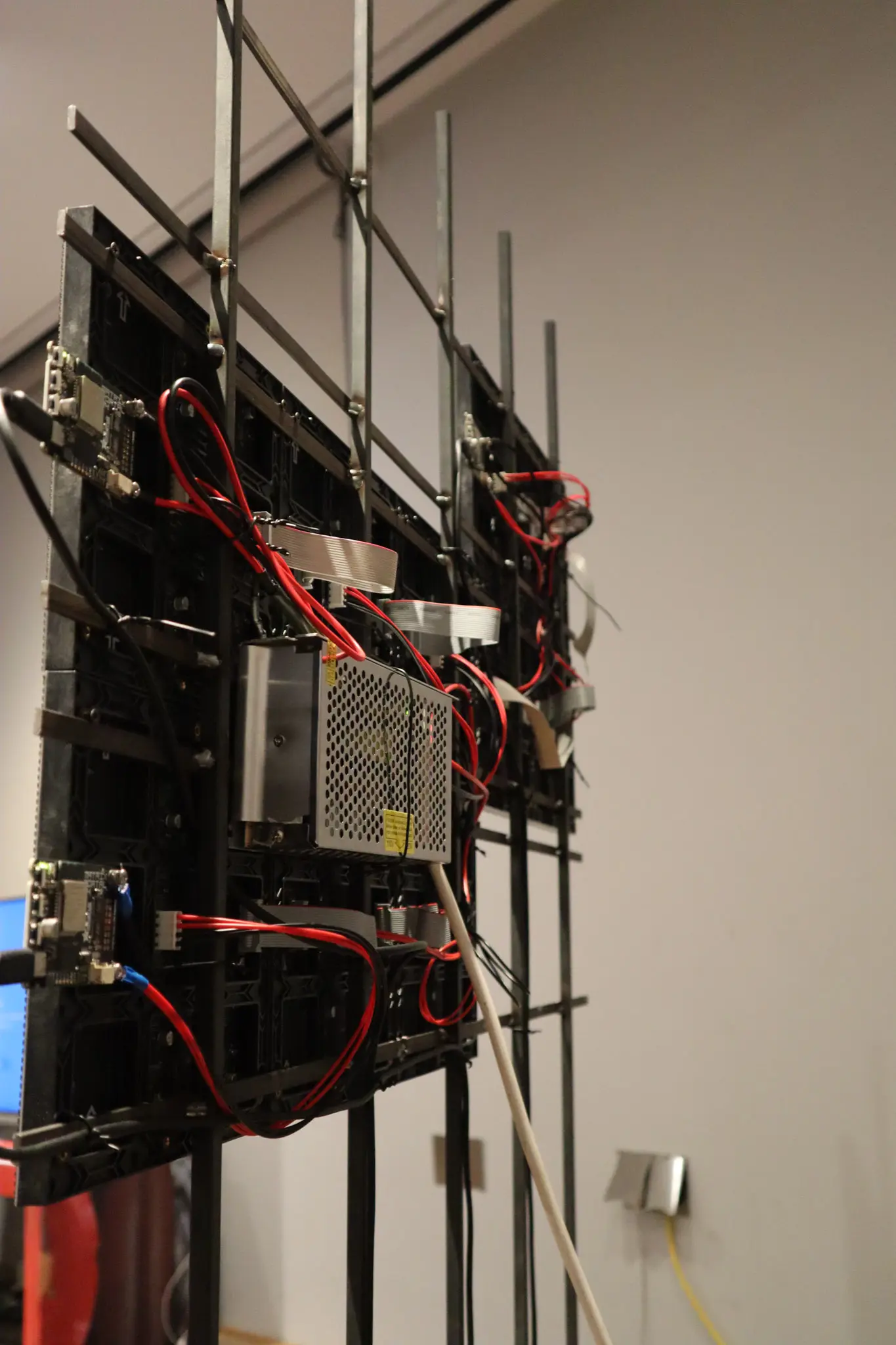 LED panels in a darkened room mid-animation