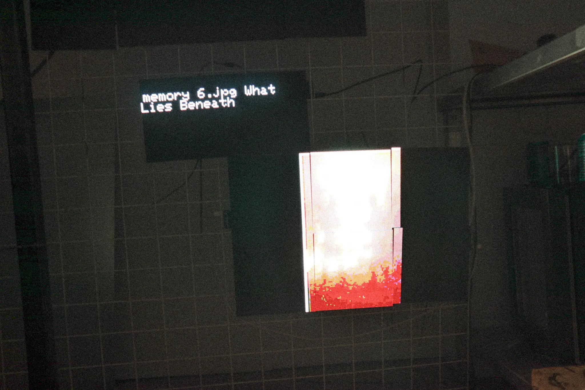 LED panels in a darkened room mid-animation