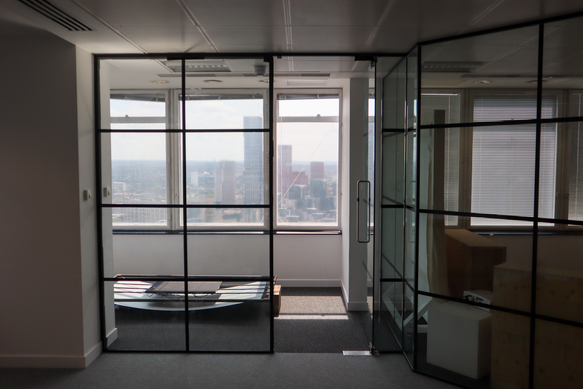 room with metal sheets and a LED panels littup