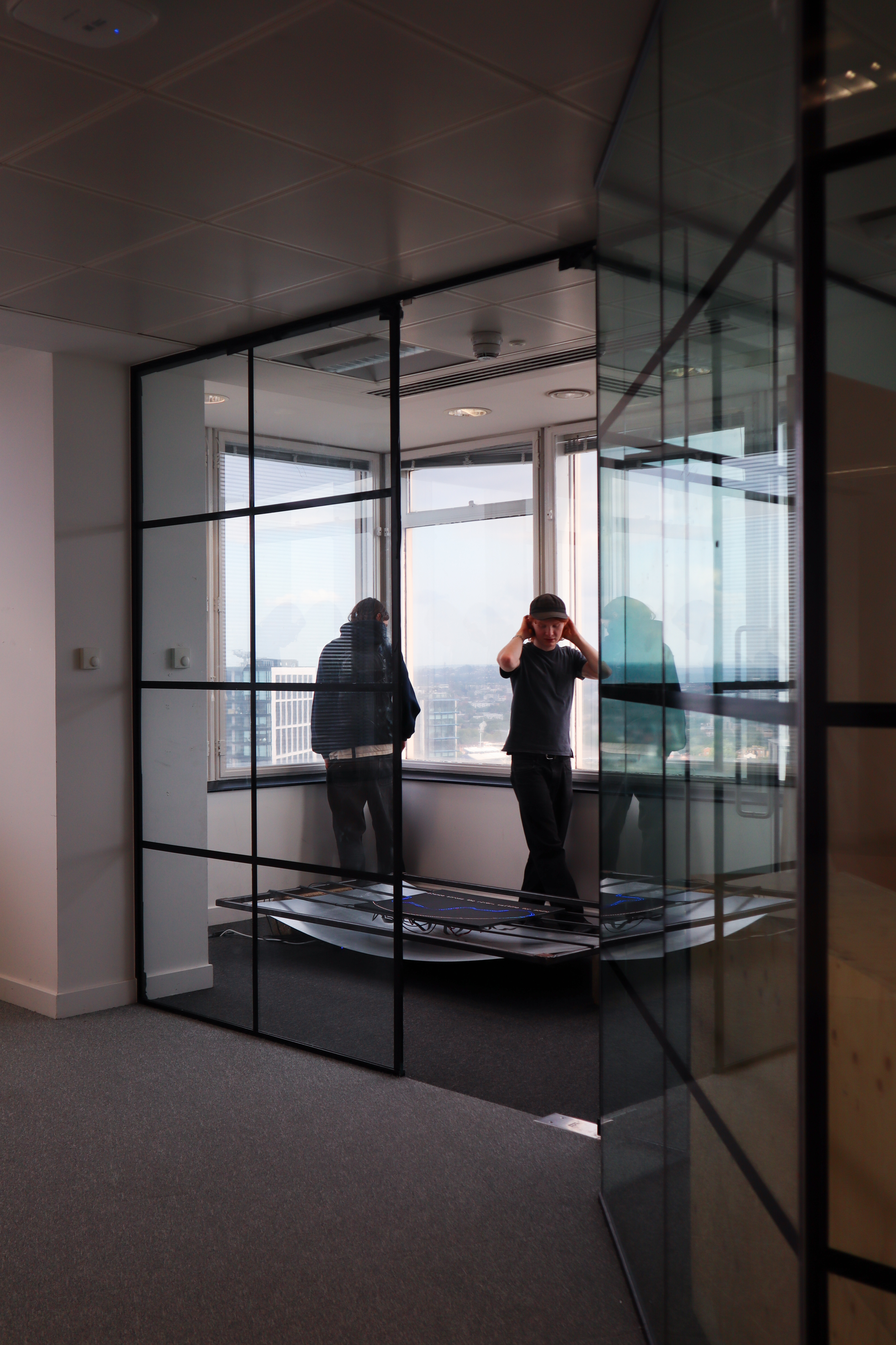 room with metal sheets and a LED panels littup